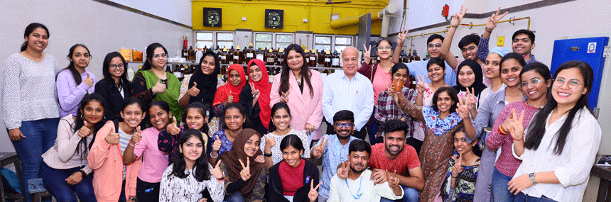 Shalini Arya (right side) holding a cup with a millet-based traditional drink, at an event celebrating the International Year of Millets 2023. (Photo: Milind Kadam)