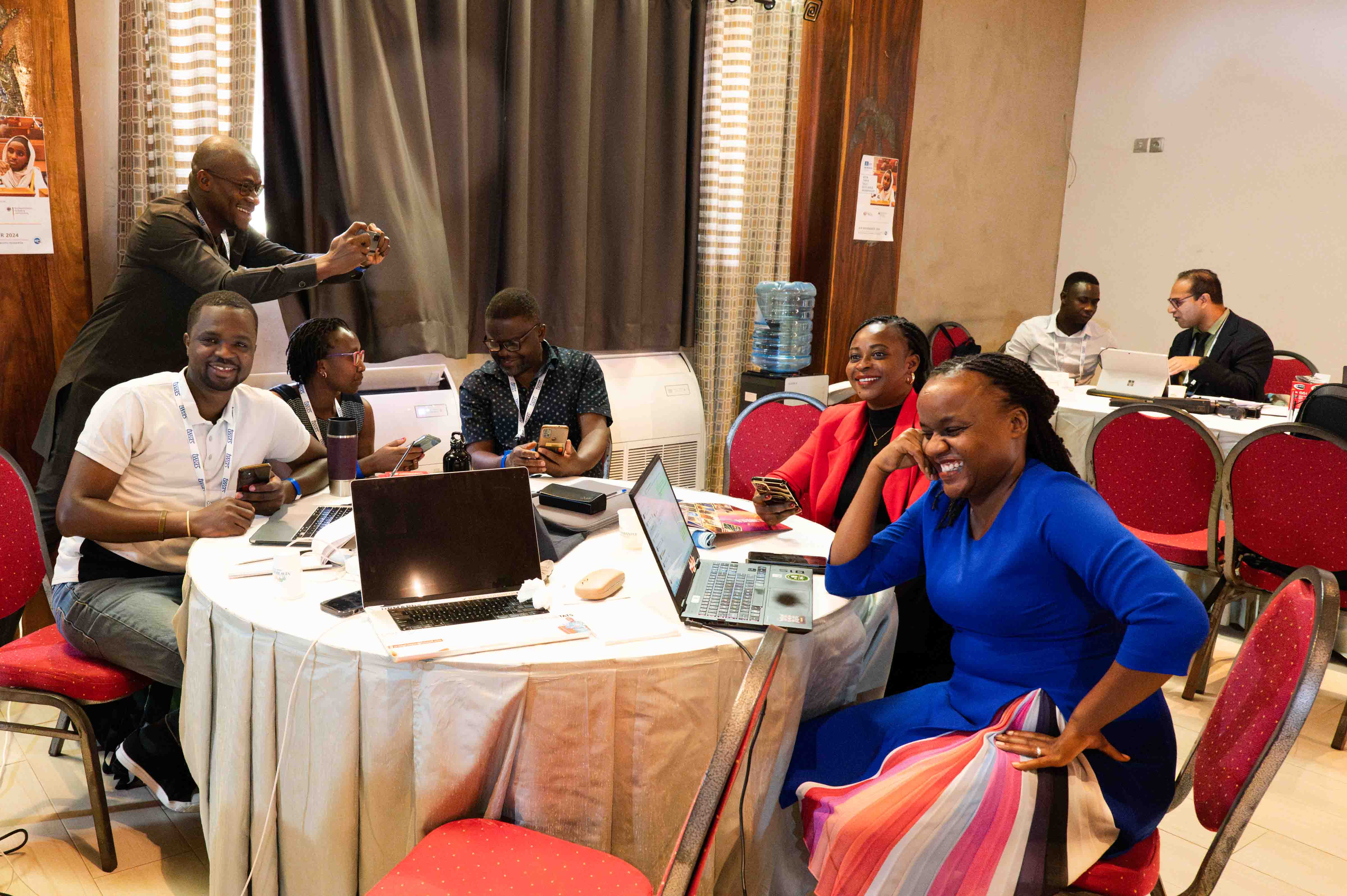 From left: Victorien Dougnon (standing), URMAPha Université d’Abomey-Calavi; Yannick Belo Nuapia, SG-NAPI Grantee, University of Kinshasa School of Pharmacy, Kinshasa, Congo, Dem. Rep.; Faith Jebiwot Kandie, SG-NAPI Grantee, Moi University, Eldoret, Kenya; Peter Kumpalume, Research Grantee, College of Medicine, University of Malawi, Blantyre, Malawi; Cynthia Nonterah, SG-NAPI Grantee, National Nuclear Research Institute, Legon, Accra, Ghana; and Lilian Diana Awuor Wanzare, SG-NAPI Grantee, Maseno University, Computer Science, Maseno, Kenya. (Photo: F. Persico/TWAS)