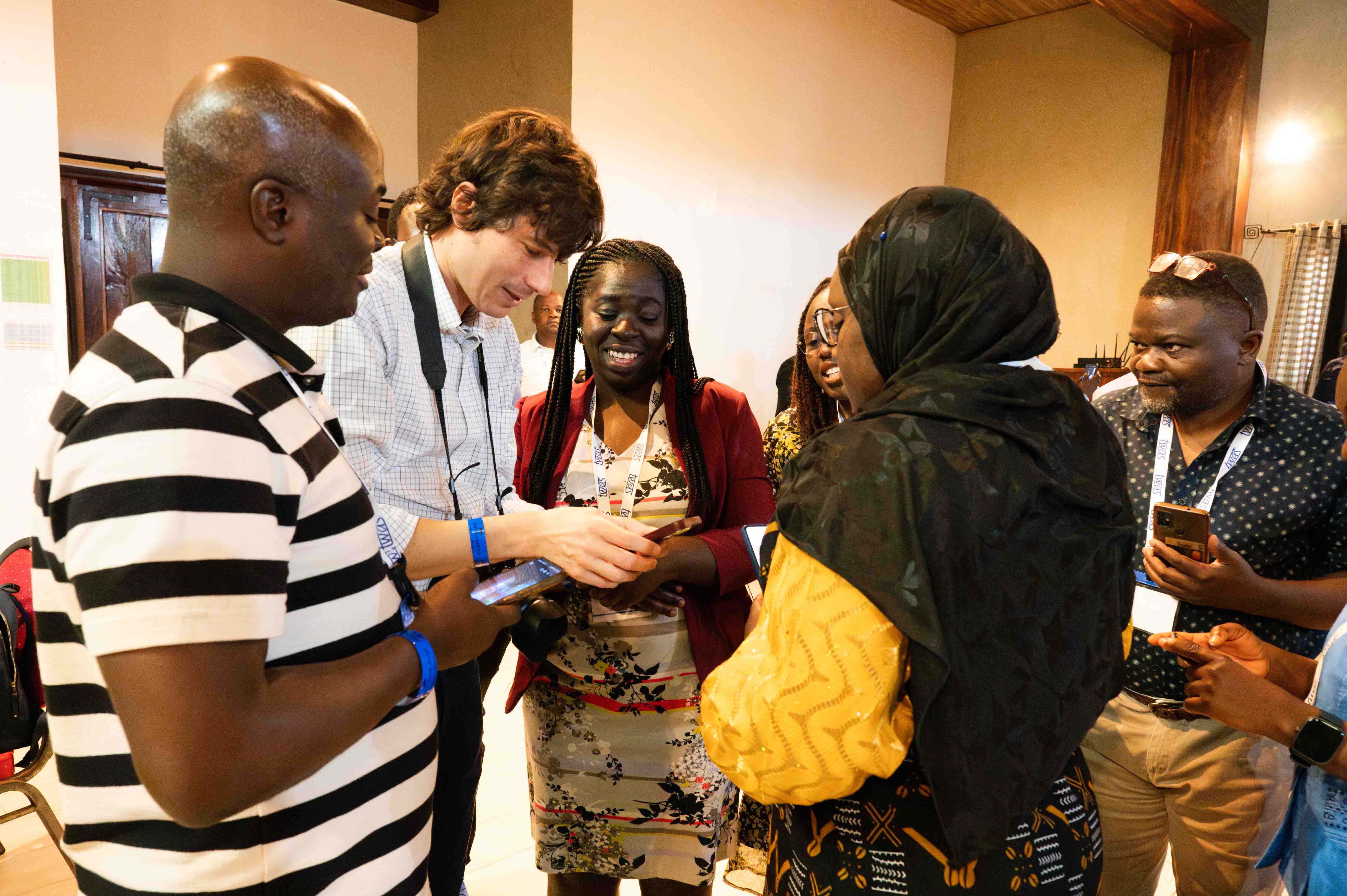 From left: Stephen Edward Moore, Research Grantee, University of Cape Coast, Cape Coast, Ghana; TWAS Public Information Officer Giovanni Ortolani; Amma Aboagyewa Larbi, Research Grantee, College of Science Kwame Nkrumah, University of Science and Technology, Kumasi, Ghana; Tani Sagna, Research Grantee, Ouagadougou, Burkina Faso; Peter Kumpalume, Research Grantee, College of Medicine, University of Malawi, Blantyre, Malawi; and Fatalmoudou dite Bolo Tandina, SG-NAPI Grantee, University of Sciences, Techniques and Technologies of Bamako, Malaria Research and Training Center, Bamako, Mali (from behind). (Photo: G. Ortolani/TWAS)