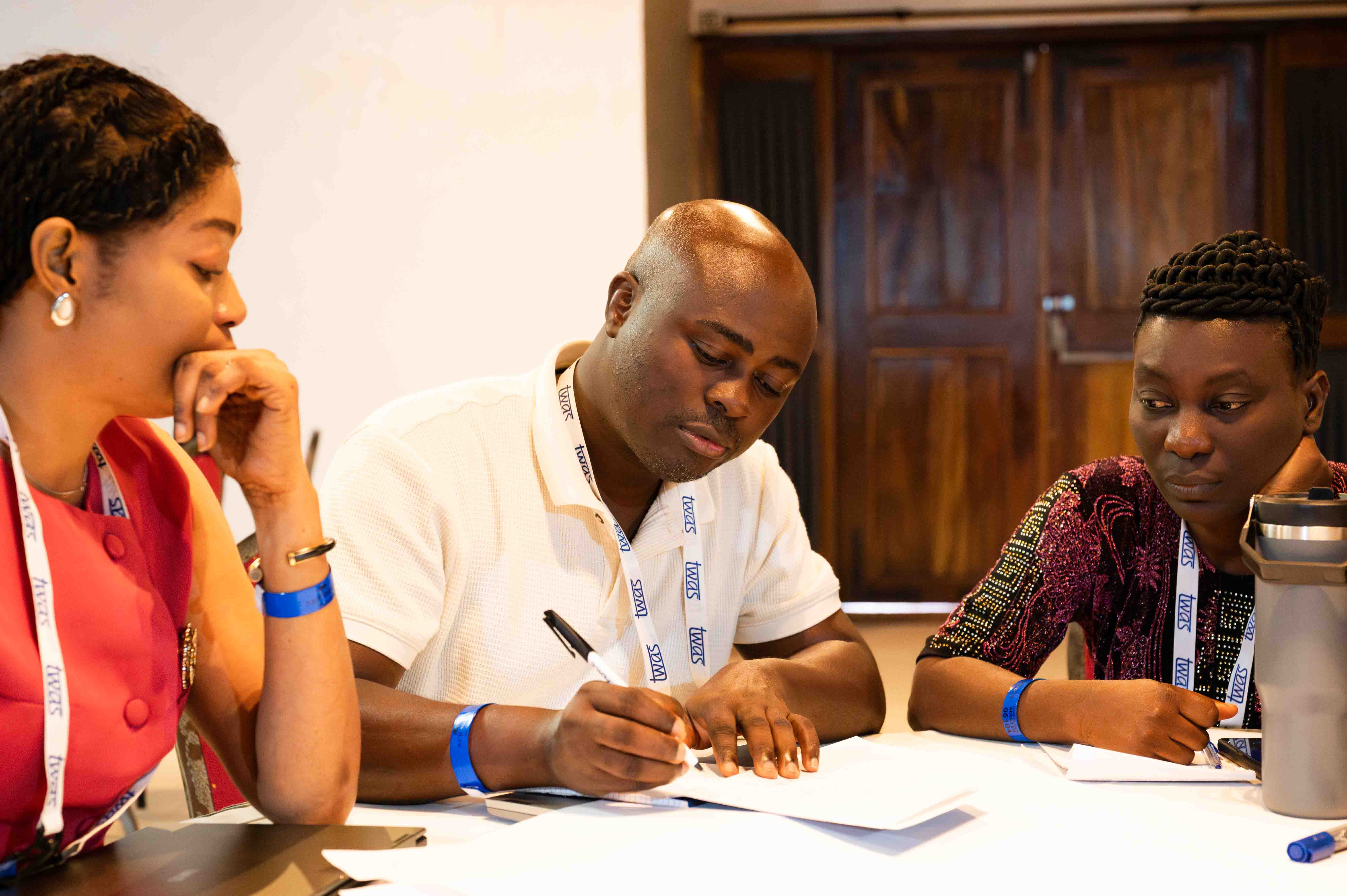 From left: Ndeye Maty Ndiaye, Research Grantee, Department of Physics Université Cheikh Anta Diop, Dakar, Senegal; Stephen Edward Moore, Research Grantee, University of Cape Coast, Cape Coast, Ghana; and Olayinka Oluwaseun Oluwasina, SG-NAPI Grantee, The Federal University of Technology, Department of Marine Science and Technology, Akure, Nigeria. (Photo: G. Ortolani/TWAS)